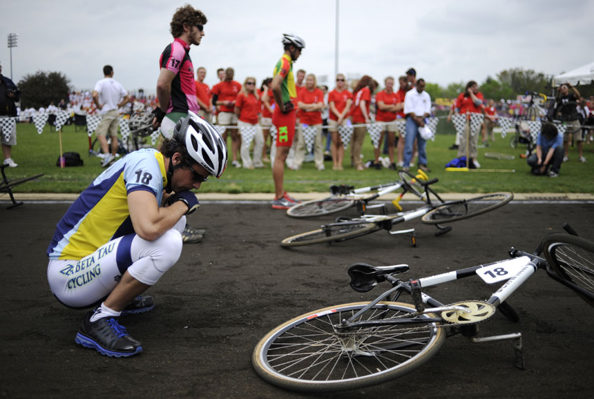 Zeta Beta Tau rider Matthew Cin, left, pauses for a moment during pre-race festivities at the Men's Little 500 on Saturday, April 24, 2010, at Bill Armstrong Stadium.