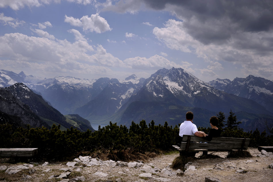 A couple enjoys a view of the Alps from a viewing area near the Kehlsteinhaus (Eagle's Nest) on Tuesday, May 25, 2010, near Berchtesgaden, Germany.