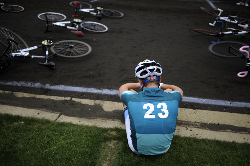 Emanon rider Alex Ray takes a moment to himself sitting on the gutter of the track during pre-race festivities before the start of the 60th Men's Little 500 on Saturday, April 24, 2010, at Bill Armstrong Stadium.