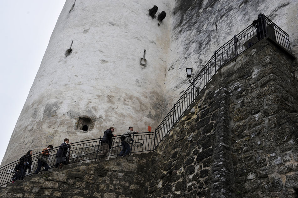 Visitors climb a staircase into the Festung (Fortress) on Friday, May 21, 2010, in Salzburg, Austria. The Festung is one of the city's most well-known landmarks.