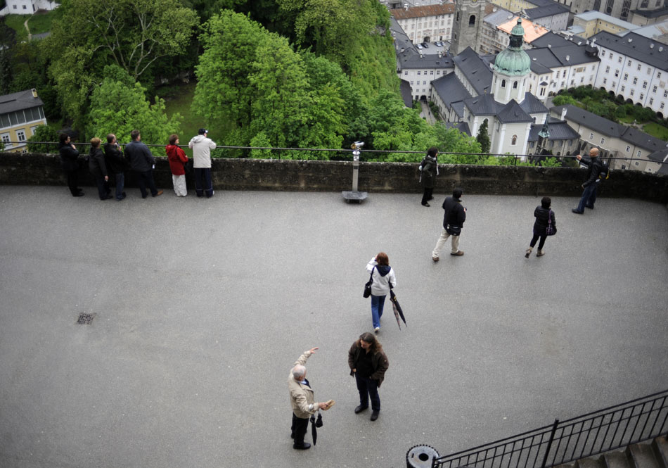 Tourists enjoy a view of the Salzburg Old City on Friday, May 21, 2010, from the Salzburg Festung (Fortress) in Austria.