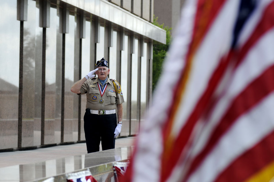 Andrew "Buddy" Blair, a Korean War veteran, salutes the flag during a ceremony marking the 60th Anniversary of the start of the Korean War at the Texas Korean War Veterans Memorial on Friday, June 25, 2010.