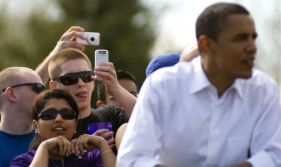 Fans take pictures of presidential hopeful Sen. Barack Obama, D-Ill., before the start of the Women's Little 500 bicycle race Friday, April 11, 2008, at Bill Armstrong Stadium. Obama made a surprise visit to town and stayed for the opening laps of the race.