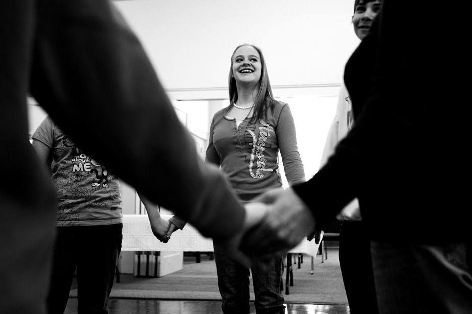 Nathalia Rap, age 16, holds hands with her peers as she takes part in a traditional Jewish dance during Hebrew School on Sunday, Feb. 27, 2011, at the Mount Sinai Congregation in Cheyenne.