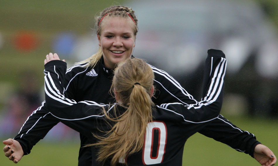 Cheyenne Central's Sierra Kuno celebrates with teammate Halee Moore after Kuno scored a goal during a girl's state soccer quarterfinal on Thursday, May 19, 2011, in Sheridan, Wyo. Central won 5-1.