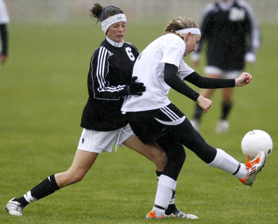 Cheyenne East's Rachel Erickson plays the ball during a girl's state soccer quarterfinal on Thursday, May 19, 2011, in Sheridan, Wyo.