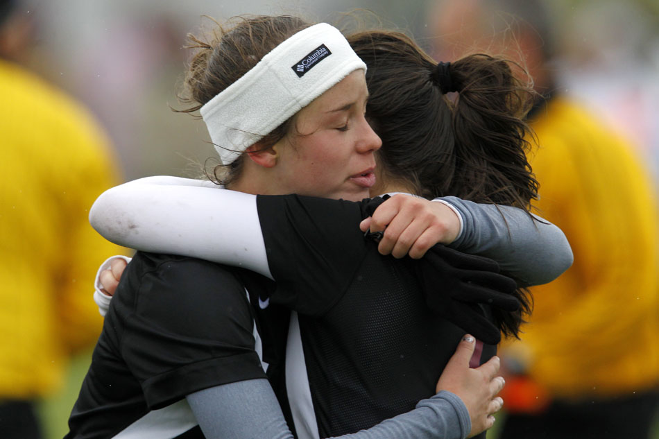 Laramie's Katie Kuhn, left, hugs teammate Haley Moon after a shootout loss to Gillette in the Class 4A girl's state soccer championship game on Saturday, May 21, 2011, in Sheridan, Wyo.