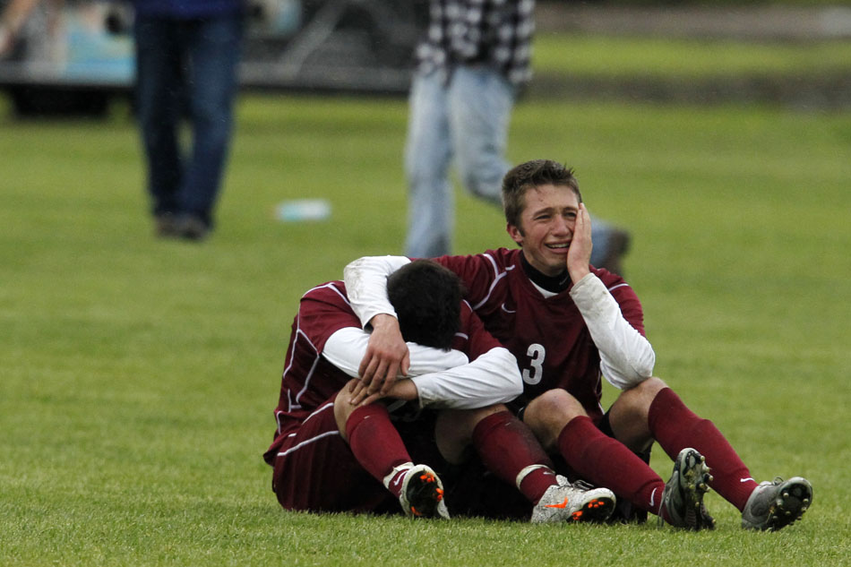 Laramie's Ian Muller (3) shares a moment with a teammate after a 2-1 loss to Sheridan in the Class 4A boy's state soccer championship game on Saturday, May 21, 2011, in Sheridan, Wyo.
