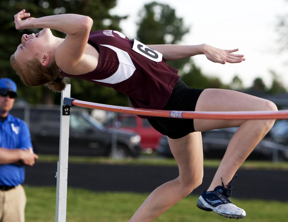 Mishawaka's Abby Darr attempts to clear the bar in the high jump during the Bremen girl's track and field sectionals on Tuesday, May 15, 2012, at Bremen High School. (James Brosher/South Bend Tribune)