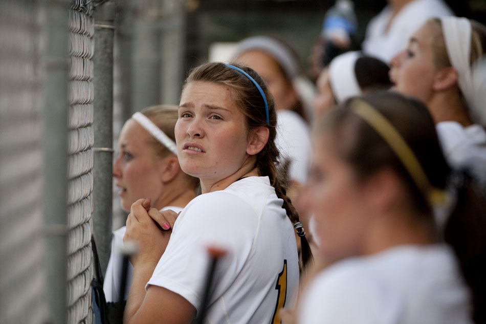 Riley players watch the action from the dugout during a Class 4A softball regional final on Tuesday, May 29, 2012, at Riley High School in South Bend. (James Brosher/South Bend Tribune)