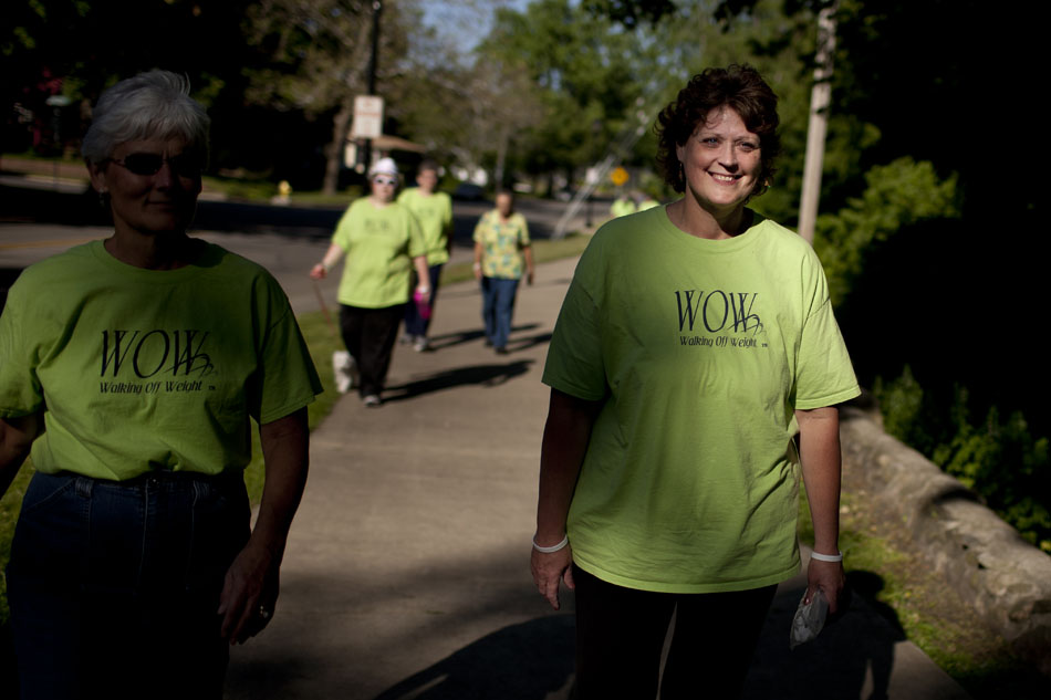 Kimmie Trethewey, right, walks with her walking group through Battell Park on Tuesday, May 22, 2012, in Mishawaka. (James Brosher/South Bend Tribune)