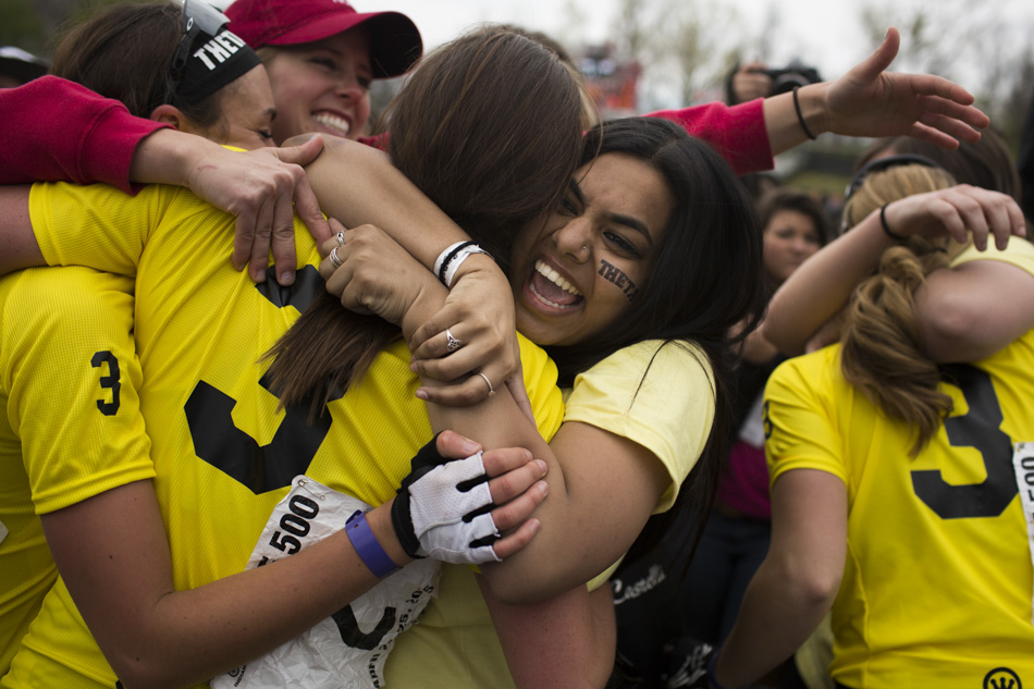 Kappa Alpha Theta fans swarm their riders after the team won the Women's Little 500 on Friday, April 24, 2015, at Bill Armstrong Stadium. (James Brosher/IU Communications)