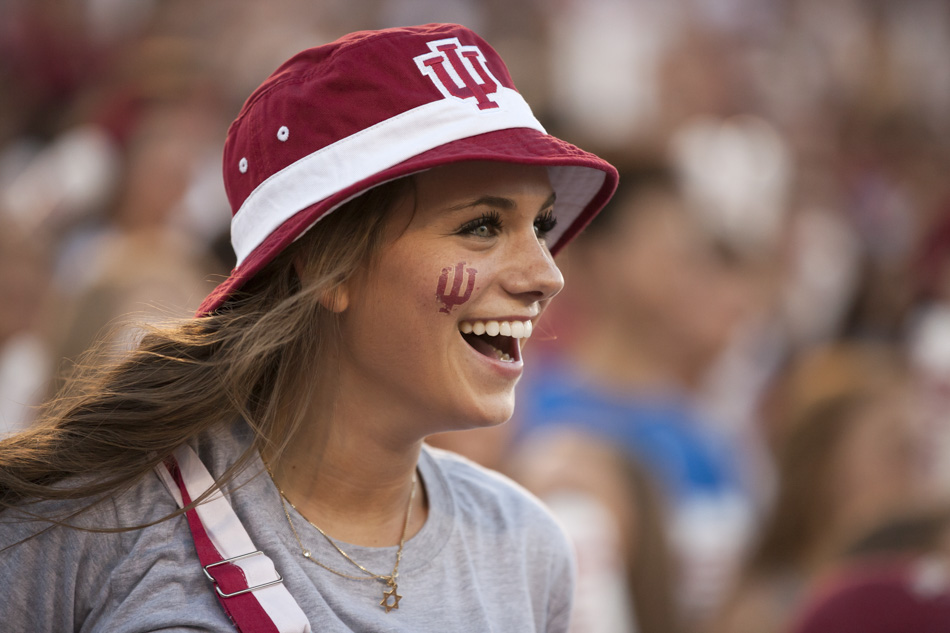 Elisa Krebs, a First Year Experiences student staffer, shares a smile during Traditions and Spirit of IU on Friday, Aug. 21, 2015, at Memorial Stadium. (James Brosher/IU Communications)
