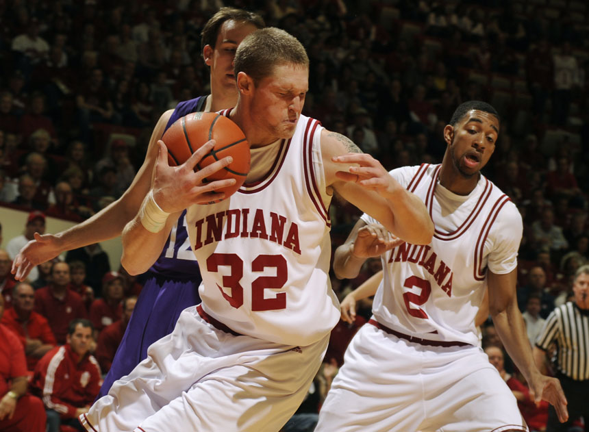 IU forward Derek Elston (32) grabs a rebound after getting hit in the eye during a game against Northwestern on Saturday, March 6, 2010, at Assembly Hall.