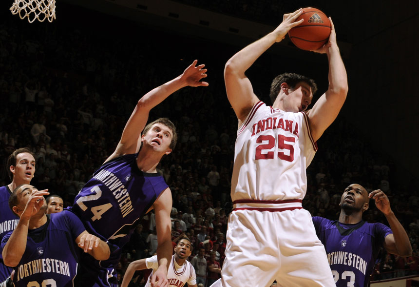 IU forward Tom Pritchard (25) grabs a rebound away from Northwestern defenders during a game on Saturday, March 6, 2010, at Assembly Hall.
