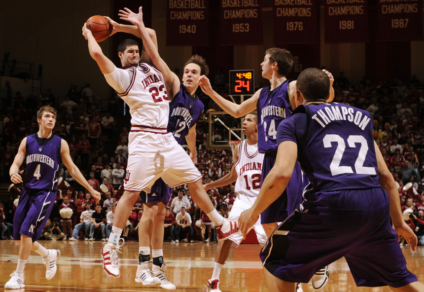 IU forward Bobby Capobianco looks to pass from the middle of Northwestern's zone defense during a game on Saturday, March 6, 2010, at Assembly Hall.