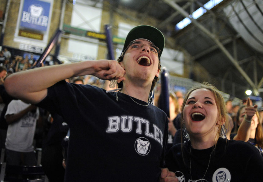 Chris Young, left, and Sarah Abernathy cheer as they watch the closing seconds of Butler's 52-50 win against Michigan State during a watching party on Saturday, April 3, 2010, at Hinkle Fieldhouse in Indianapolis. (James Brosher / IU Student News Bureau)
