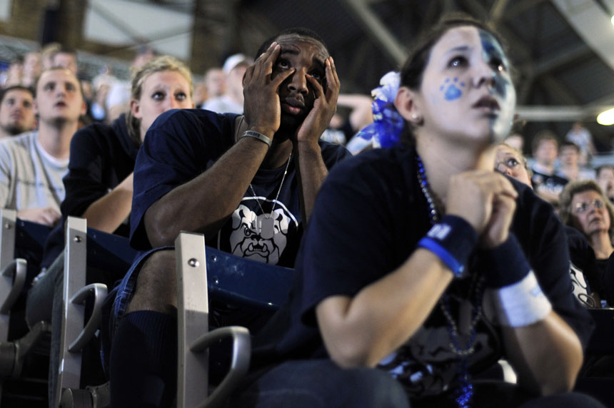 James Poscascio, a freshman at Butler, watches the action between his fingers during a viewing party of the Duke-Butler national championship game on Monday, April 5, 2010, at Hinkle Fieldhouse in Indianapolis. (James Brosher / IU Student News Bureau)