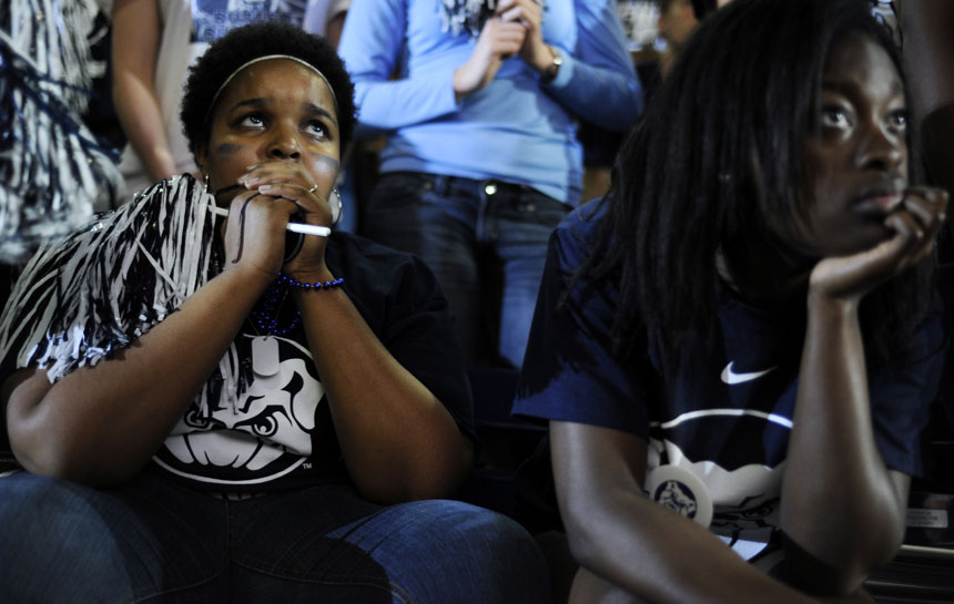 Brittany Staten, left, and Terri Newman watch a giant screen in disbelief after Gordon Hayward missed a half-court shot to win the national championship during a viewing party on Monday, April 5, 2010, at Hinkle Fieldhouse in Indianapolis. (James Brosher / IU Student News Bureau)