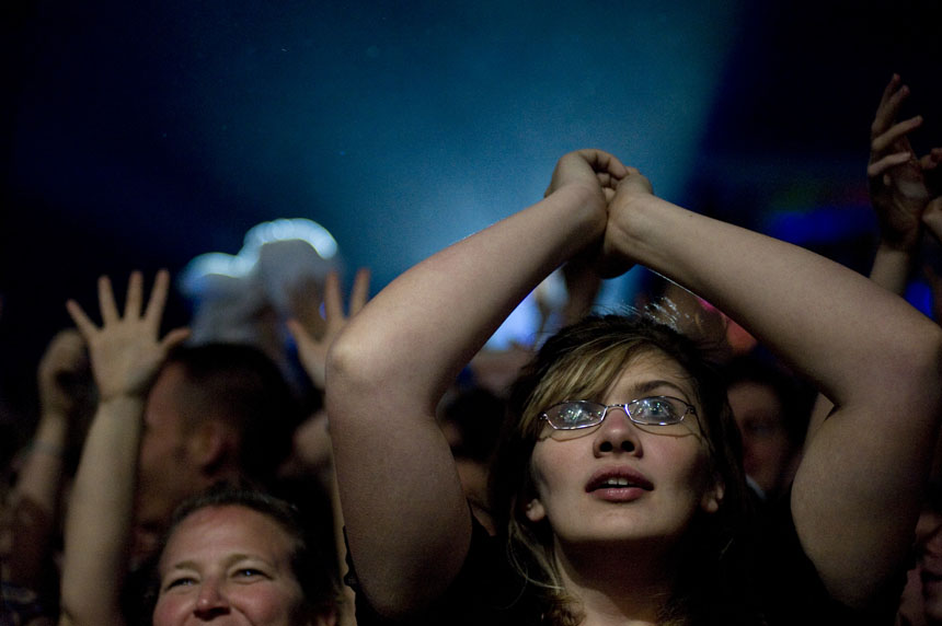A fan eagerly awaits the start of a Goo Goo Dolls concert on Sunday, April 4, 2010, at White River State Park in Indianapolis. The band played a free concert as part of a series organized for the Final Four. (James Brosher / IU Student News Bureau)