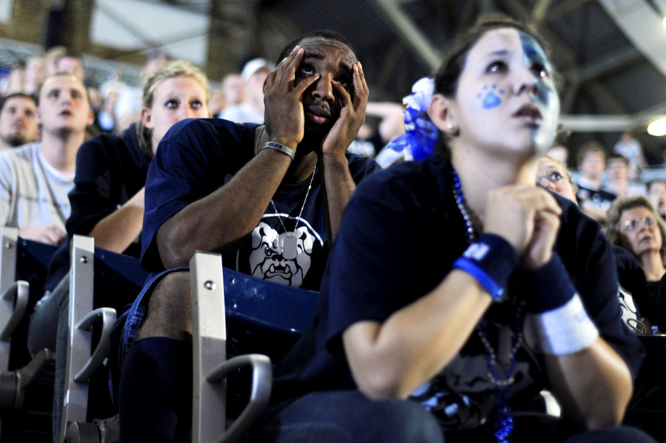 James Poscascio, a freshman at Butler, watches the action between his fingers during a viewing party of the Duke-Butler national championship game on Monday, April 5, 2010, at Hinkle Fieldhouse in Indianapolis. Butler, a mid-major program, fell just short of the school's first tournament-era national championship with a 61-59 loss to Duke.