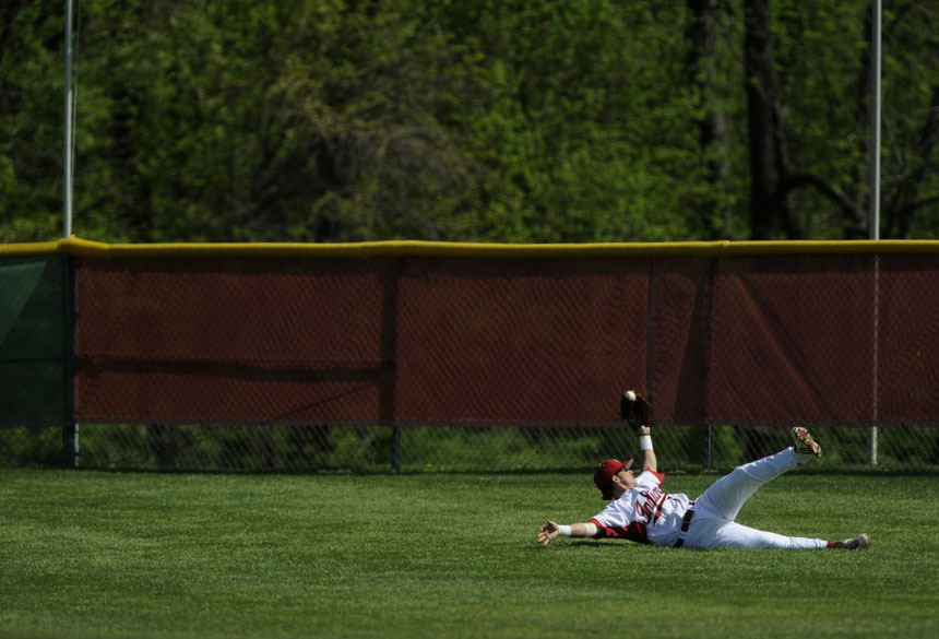 Indiana's Tyler Rogers makes a grab during the first game in a double header on Saturday, April 17, 2010, at Sembower Field.