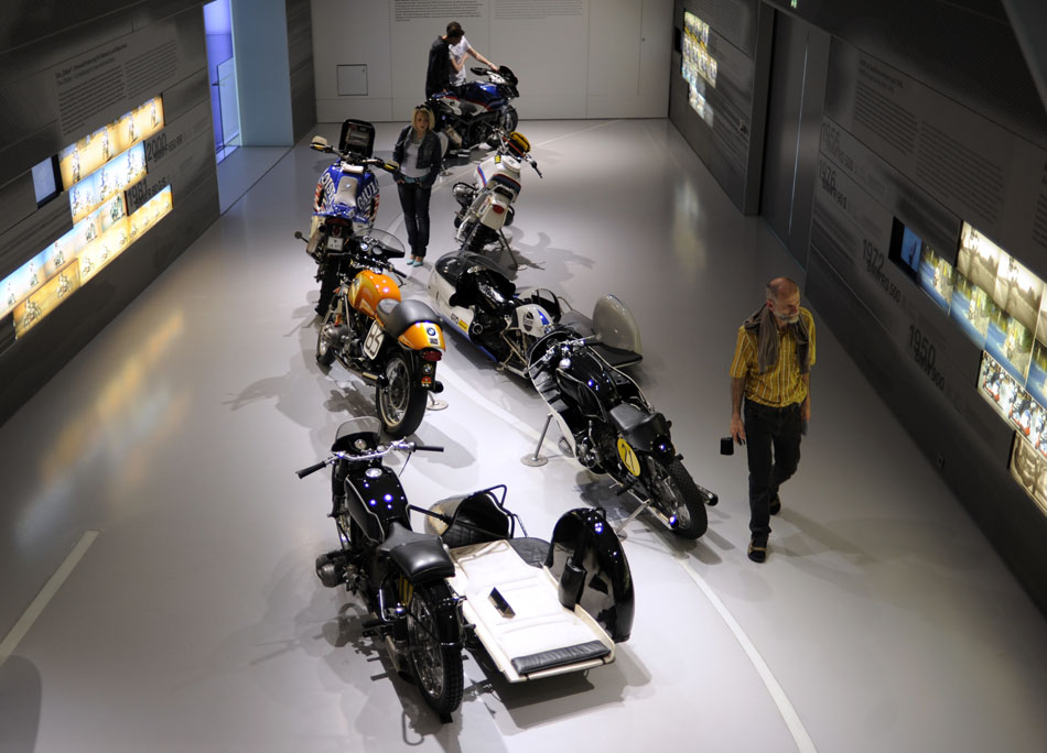 Visitors browse a room dedicated to BMW motorcycle racing history on Monday, May 24, 2010, at the BMW Museum in Munich, Germany.