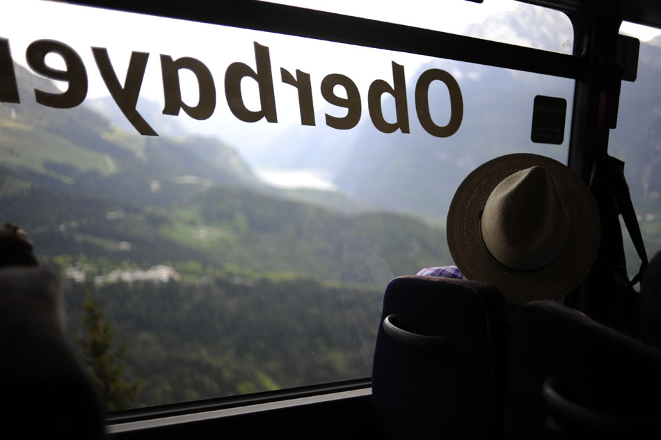 A German tourist looks down into a valley from a tour bus decending from the Kehlsteinhaus (Eagle's Nest) on Tuesday, May 25, 2010, near Berchtesgaden, Germany. Visitors to the house must take two buses and an elevator to reach the mountain-top site.