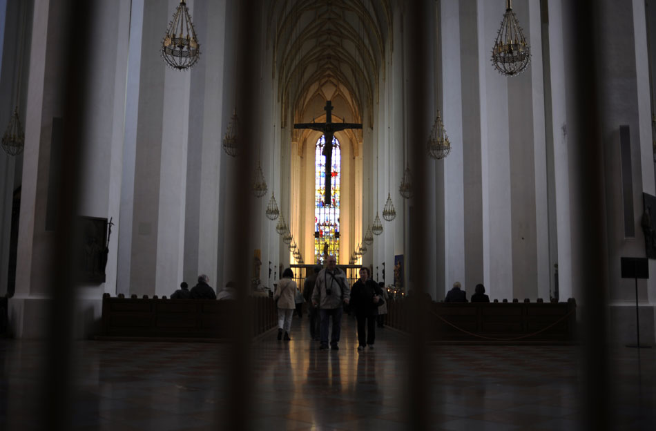 Visitors make their way through the Frauenkirche (Cathedral of Our Dear Lady) on Thursday, May 20, 2010, in Munich.