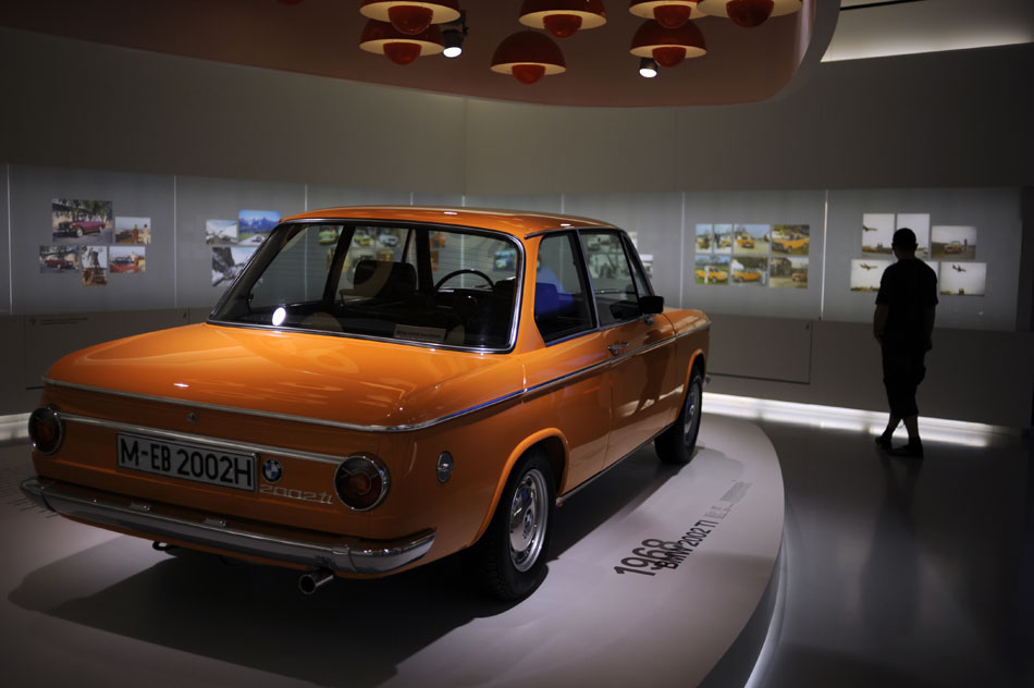 A 1968 BMW 2002 TI sits on display on Monday, May 24, 2010, in the BMW Museum in Munich, Germany. The model was available in bright colors in an attempt by BMW to attract American customers in the 1960s.