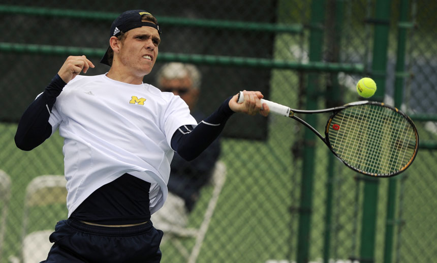 Michigan's Chris Madden returns the ball in a doubles match against Illinois during the Big Ten Men's Tennis Tournament on Saturday, May 1, 2010, at Indiana University in Bloomington, Ind.