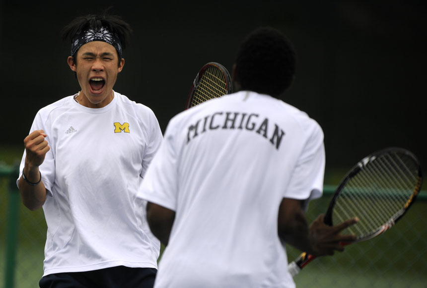 Michigan's Jason Jung, left, celebrates with his doubles partner Evan King after winning a match against Illinois' Marek Czerwinski and Abe Souza during the Big Ten Men's Tennis Tournament on Saturday, May 1, 2010, at Indiana University in Bloomington, Ind.