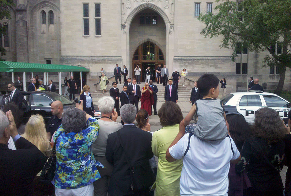 The Dalai Lama exits the Indiana Memorial Union on Thursday, May 13, 2010, on the Indiana University campus in Bloomington, Ind.
