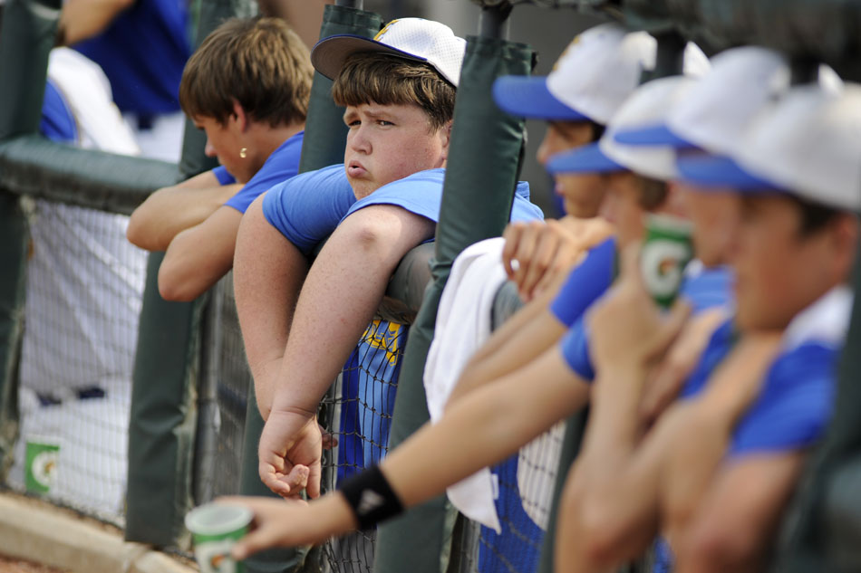 An Evadale manager watches the action from the dugout during a Class 1A baseball semifinal against Thorndale at Dell Diamond in Round Rock on Wednesday, June 9, 2010.