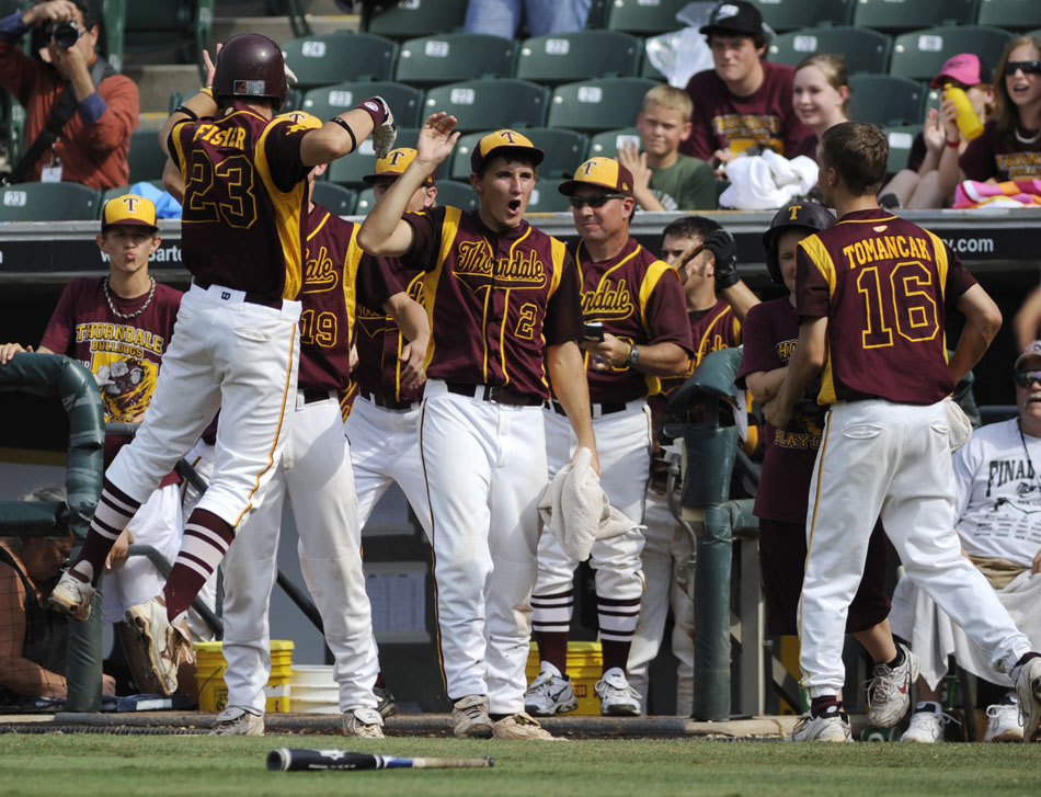 Thorndale players react after Weston Fisher (23) scored a run during a Class 1A baseball semifinal against Evadale at Dell Diamond in Round Rock on Wednesday, June 9, 2010. Evadale won 5-4 to advance to the championship game on Thursday.