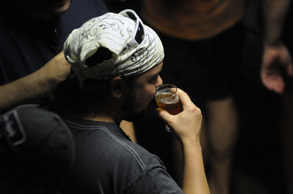 A patron samples one of the several beers at the Great Austin Beer Festival on Saturday, June 26, 2010.
