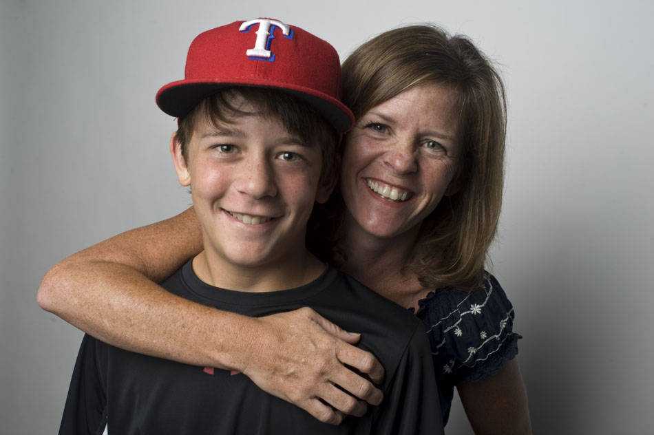 Ann Sahm, right, poses for a portrait with her son, Alec, in studio on Tuesday, June 22, 2010.