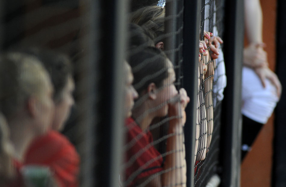 Bowie players watch the action from the dugout in the first inning of a Class 5A softball semifinal against Tomball at the University of Texas on Friday, June 4, 2010.