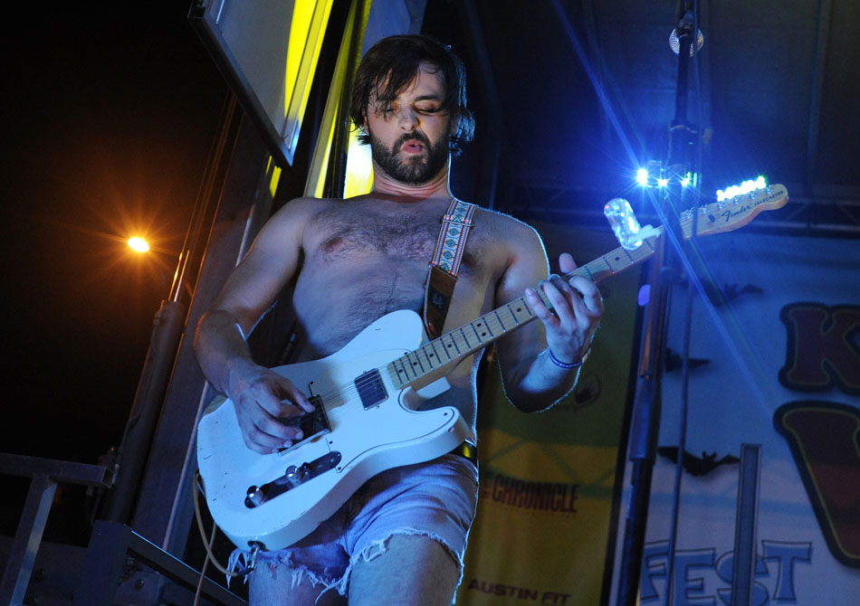 Curtis Roush, the guitarist for The Bright Light Social Hour, grunts as he rips into a guitar solo during a performance at the Keep Austin Weird Festival on Saturday, June 26, 2010.