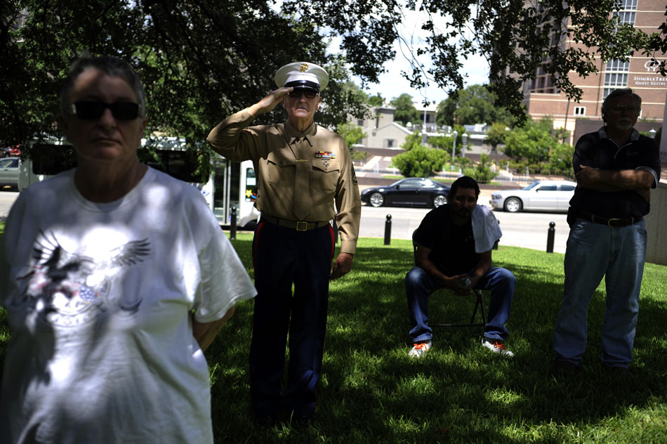 Marine Staff Sgt. Jack Clark, a  Korean War veteran, salutes the flag at the end of a ceremony marking the 60th anniversary of the start of the conflict at the Texas Korean War Veterans Memorial on Friday, June 25, 2010.
