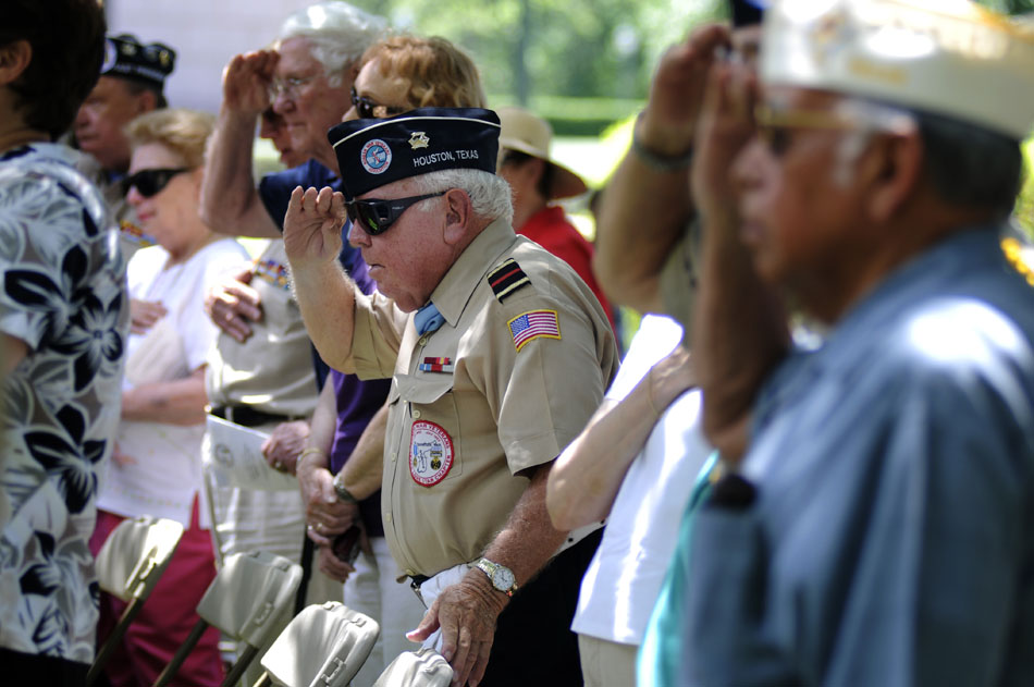 Korean War veteran Bennie Younger salutes the flag during a ceremony marking the 60th Anniversary of the start of the Korean War on Friday, June 25, 2010.