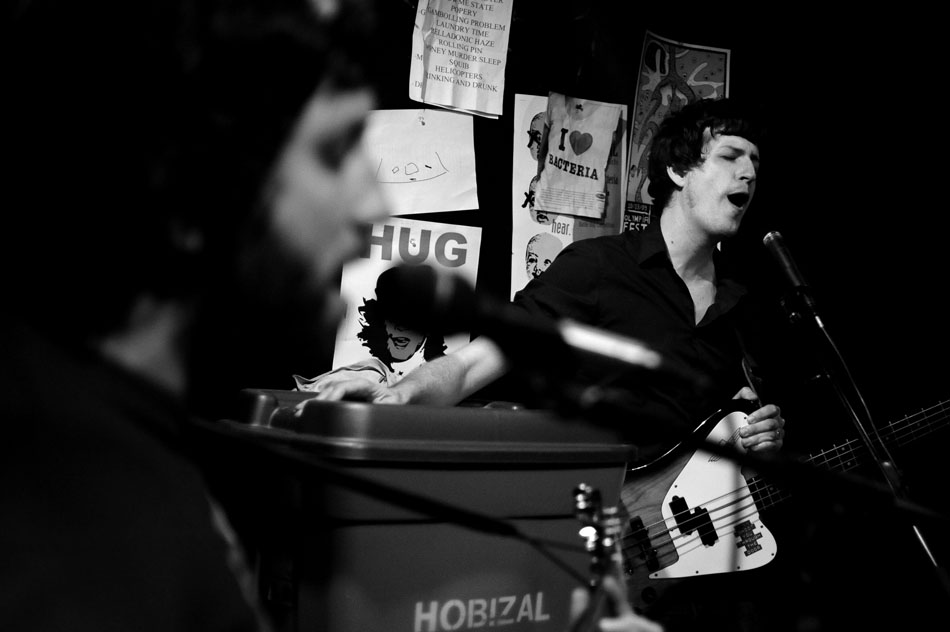 Ola Podrida bassist Andrew Kenny, right, sings some backing vocals during a practice on Tuesday, June 29, 2010.