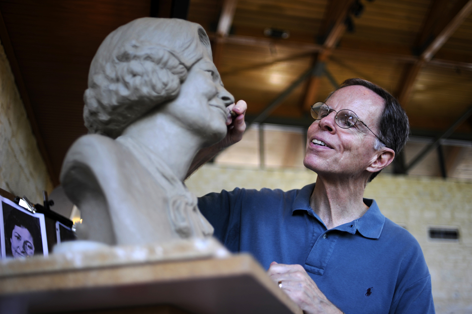 Joe Kenney works on a clay sculpture of Lady Bird Johnson at the LBJ Wildflower Center on Sunday, July 25, 2010. Kenney, who has been working on the piece off and on for the past year, hopes to have the soon-to-be completed bust will be cast into bronze and displayed at the center.