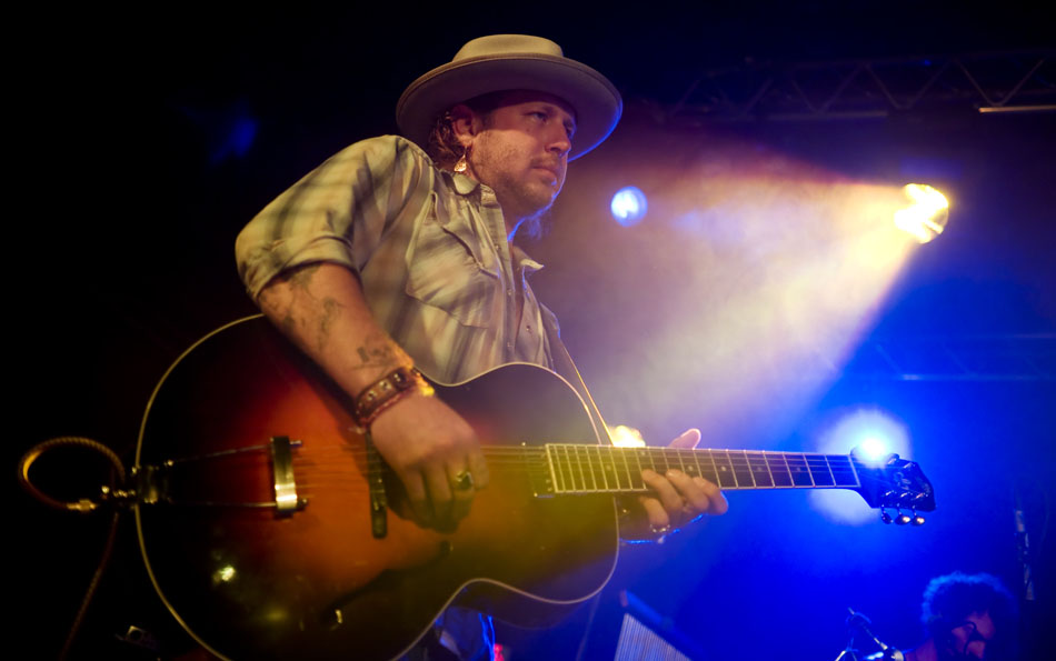 Christian Letts, guitarist for Edward Sharpe and the Magnetic Zeros, plays during a sold-out performance at La Zona Rosa on Tuesday, July 6, 2010.