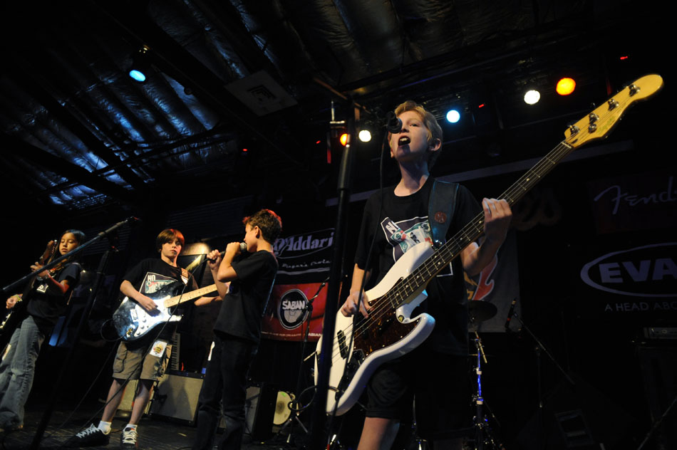 Rock Camp USA No Refund bassist Kyle Legg, right, adds some backing vocals to a song during the Rock Camp USA concert at Antone's on Saturday, July 24, 2010.