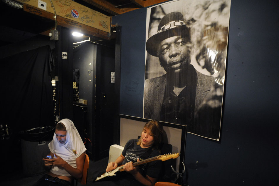 Explosion of the Minds members Ross Eide, left, and Dylan Hill relax in the green room before their set during the Rock Camp USA concert at Antone's on Saturday, July 24, 2010.