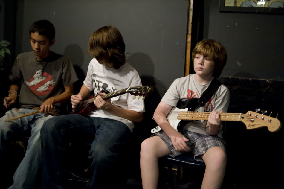 Roy Fenner, bassist with the band Fat Boy and the Midnight Snackie, waits with fellow band members in the green room before the bands set during the Rock Camp USA concert at Antone's on Saturday, July 24, 2010.