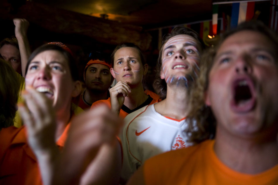 A Dutch fan nervously watches the action as she watches the Netherlands battle Spain for the World Cup at Fado Irish Pub on Sunday, July 11, 2010.