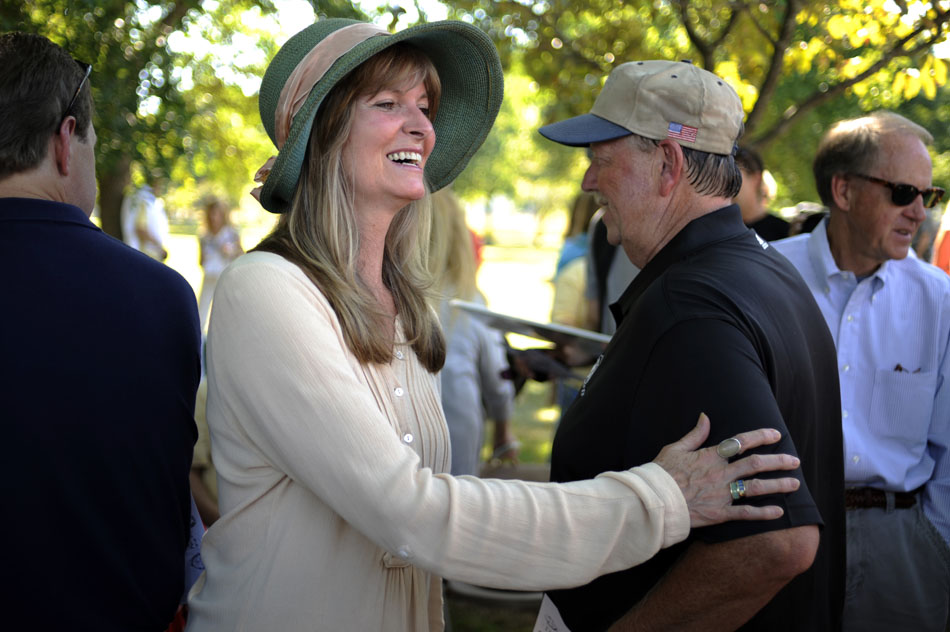 Jean Fogelberg, the widow of Dan Fogelberg, shares a smile with a fan after a ceremony dedicating a new memorial in honor of the late singer/songwriter on Saturday, Aug. 28, 2010, at Riverside Park.