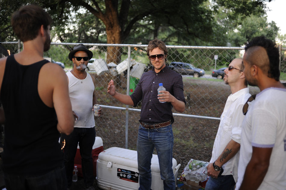 Charlie Mars, middle, gets his band pumped up before performing at Blues on the Green in Zilker Park on Wednesday,  Aug. 4, 2010.
